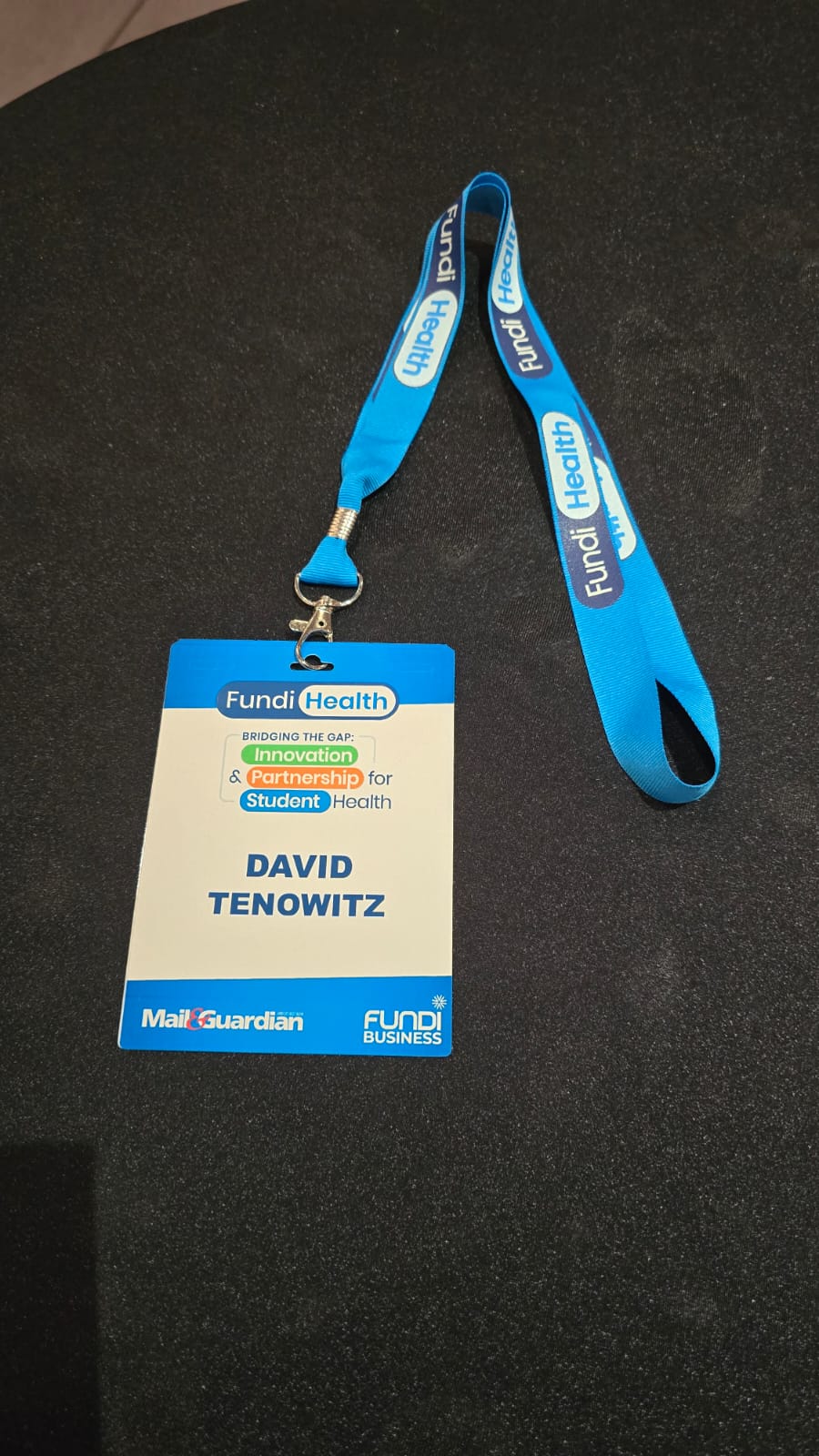 Fundi Health 2025 full colour name badge front with customised blue lanyard