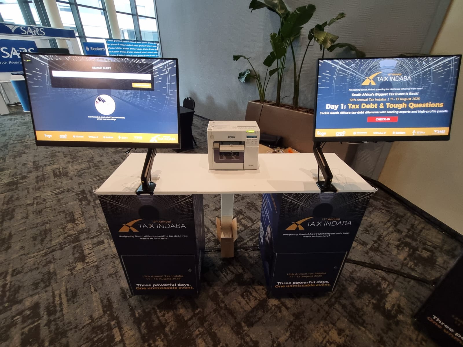 Tax Indaba 2025 touchscreen registration kiosks and badge printer